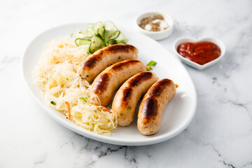 Homemade sausages with sauerkraut