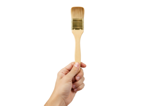 Isolated hand holding a small paintbrush, ready to paint or apply stain to a surface
