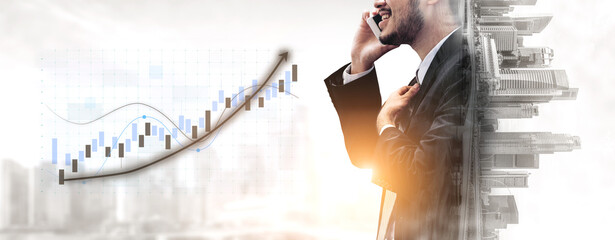 A confident businessman in a suit engages in a phone conversation, surrounded by a financial graph and a modern cityscape. This image symbolizes success and professional growth. Impute
