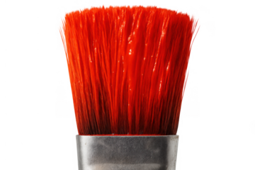 Paintbrush with vibrant red bristles dipped in paint, symbolizing creativity, art, and inspiration on transparent background