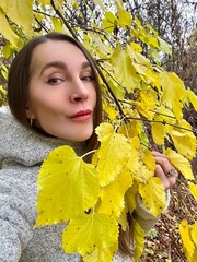 young woman in autumn park