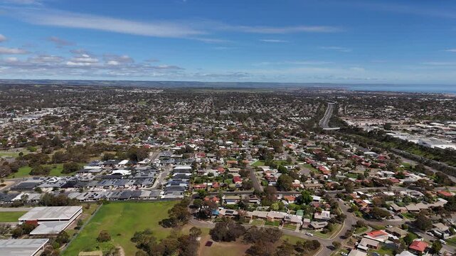 Morphett Vale, South Adelaide, South Australia &ndash; 4K Aerial Drone Footage of Residential Suburb, Parks and Low-Density Houses with Solar Panels along the Southern Expressway, Lonsdale Industrial Zone