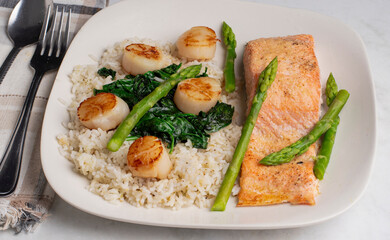baked salmon   with scallops  and rice