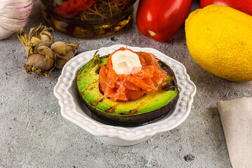Whole grilled avocado with salmon