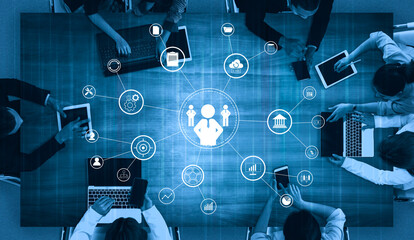 A concept of centralized business management and corporate strategy. A leadership team connecting to all functions like finance, operations, and planning. Motif