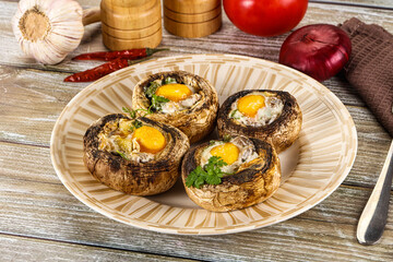 Baked champignon with quail egg