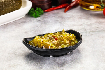 Souce gherkin relish with marinated cucumbers