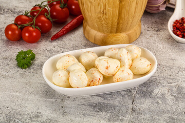 Mozzarella balls cheese in the bowl