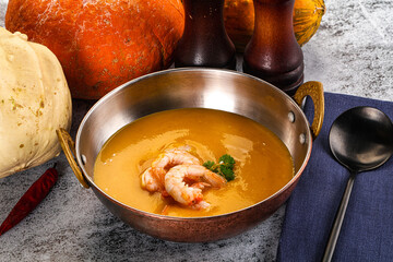Pumpkin cream soup with prawns