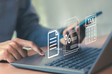 Tax return calculation concept financial research government tax businessman using laptop filling out income tax form online for payment	
