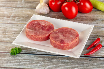 Raw round tuna fish fillet