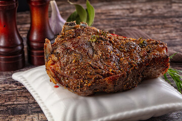 Baked beef steak on the bone