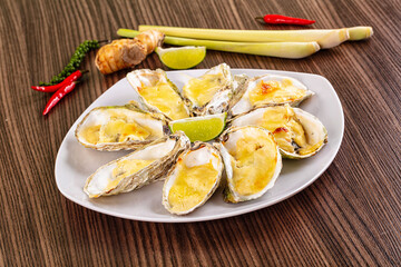 Gourmet baked oysters with cheese