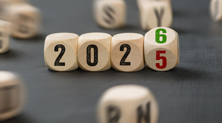 Letter dice with the number 2025 and 2026
