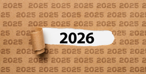 Torn paper revealing the number 2026