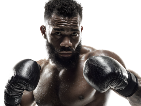 Closeup of a black man with a beard, wearing boxing gloves and sweating