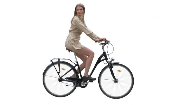 Woman riding a bicycle in side view on white and transparent background. Pre-keyed green screen video with an alpha channel and in prores-format