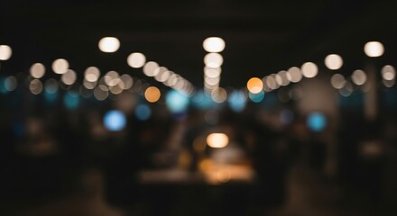 heavily blurred background of a busy office interior at night. The focus is entirely on the bokeh effect, with warm and cool light orbs from computer monitors, ceiling lights, and windows.