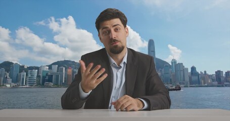 A modern live streaming studio with professional equipment and a host ready to engage viewers online. A man in a suit presents information or news. Ideal for media production.