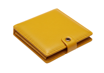 Isolated yellow leather wallet with strap and metal snap, lying flat on surface