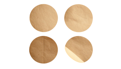 Four circular brown paper discs, flat, even lighting