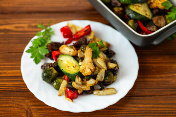 Tasty vegetarian meal with cauliflower zucchini and bell peppers