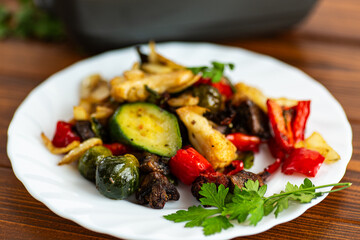 Rustic homemade meal with roasted vegetables and olive oil