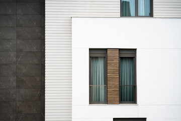 window with shutters in modern white brown building design architecture 
