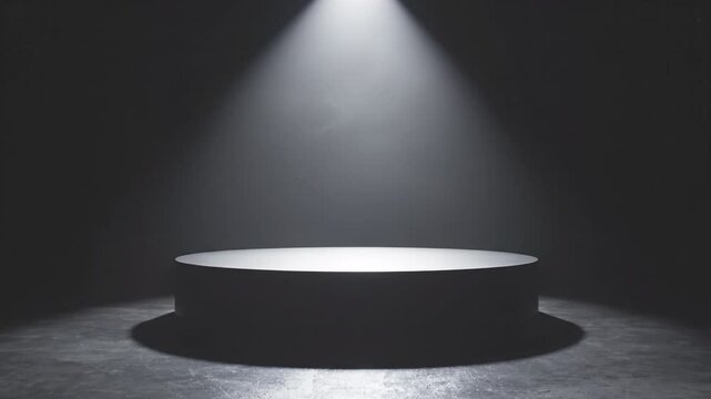 Empty round platform illuminated by spotlight in dark room with concrete floor, casting light and shadow on stage circle, creating dramatic and mysterious atmosphere for performance and presentation