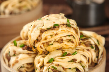Handmade Steamed Meat Buns with Scallions - Traditional Asian Dumplings in Bamboo Steamer