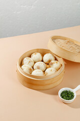 Freshly Steamed Xiaolongbao Chinese Soup Dumplings in Bamboo Steamer Traditional Asian Dim Sum Food