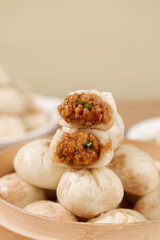 Fresh Xiaolongbao Chinese Soup Dumplings with Pork Filling in Steamer Basket Traditional Asian Dim Sum Breakfast Food