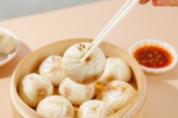 Traditional Shengzhou Soup Dumplings with Fresh Meat in Bamboo Steamer - Chinese Dim Sum Cuisine