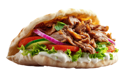Savory meat, fresh vegetables, and creamy sauce fill a warm pita
