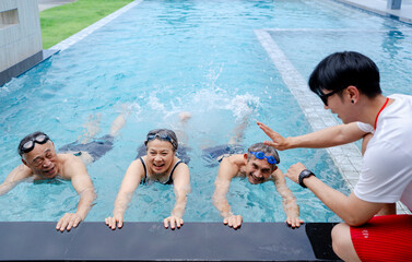 group of asian senior people exercise swimming at sport club swimming pool, active adult enjoy summer vacation happy retirement, elderly friends travel wellness life healthy lifestyle