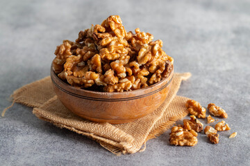 Walnuts are crunchy, brain-shaped nuts rich in omega-3, antioxidants, and protein, promoting heart, brain, and overall body health.
