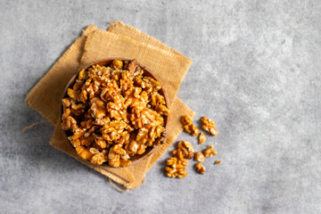 Walnuts are crunchy, brain-shaped nuts rich in omega-3, antioxidants, and protein, promoting heart, brain, and overall body health.
