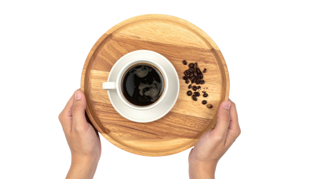 Coffee cup and beans on wood tray, held by hands