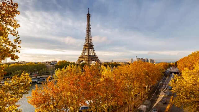 Sunrise time lapse view of the skyline of Paris, France, with Eiffel Tower and Street traffic in golden morning sunlight
