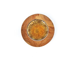 Coriander boiled water in glass on white background. Healthy drink lifestyle, flat lay 