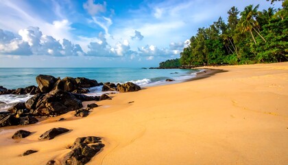 Idyllic Beach Scene with Rocks and Lush Vegetation.