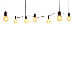 A string of vintage Edison light bulbs hanging against a white background.