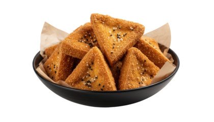 Delicious crispy fried tofu triangles in a black bowl