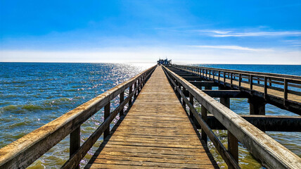 The historic jetty in Swakopmund is one of the town's most outstanding beach side features. Is a former ship landing (sea pier) in the South Atlantic Ocean. Namibia, Africa.