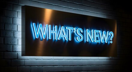 Neon sign reading 'What's New?' on a brick building in a city at night.