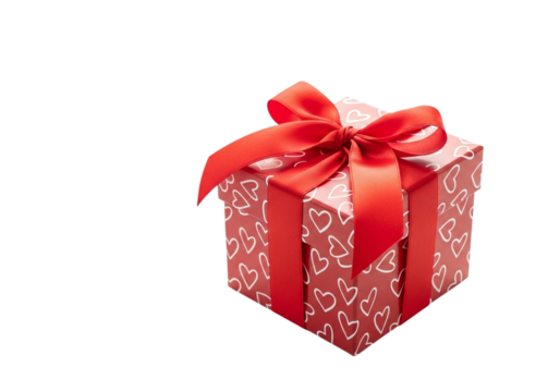 A red gift box with a white heart pattern and a red ribbon bow