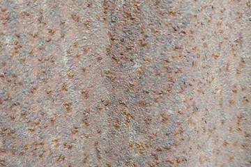 Abstract textured background with subtle pastel colors and a mottled speckled pattern