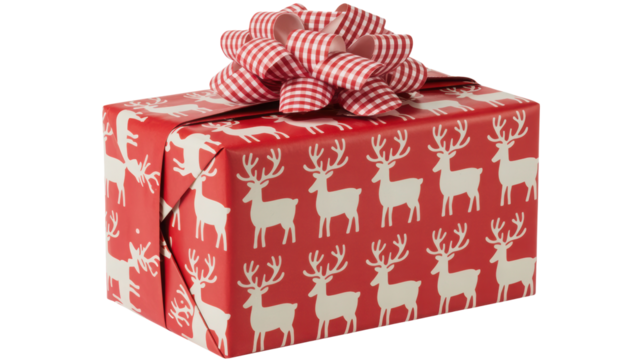Festive red christmas gift box wrapped in paper adorned with white reindeer pattern and topped with a large red and white checkered ribbon bow isolated on transparent background - Powered by Adobe