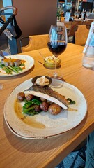 Scandinavian style baked salmon filet with potatoes at a nice restaurant