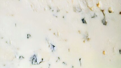 Close-up of a texture of blue cheese, Traditional taste. Cheese with mold. Concept of food, organic products, healthy, Gorgonzola, natural food.
